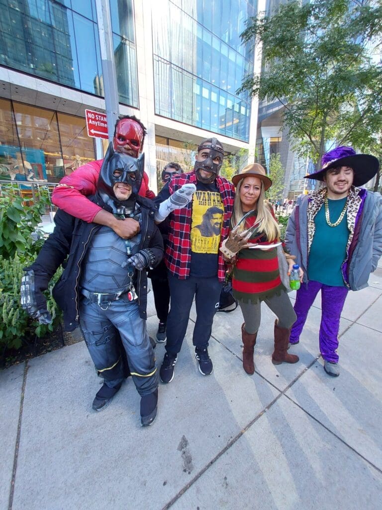 Jill Scutt alongside colleague and the individuals we support at Comic-Con