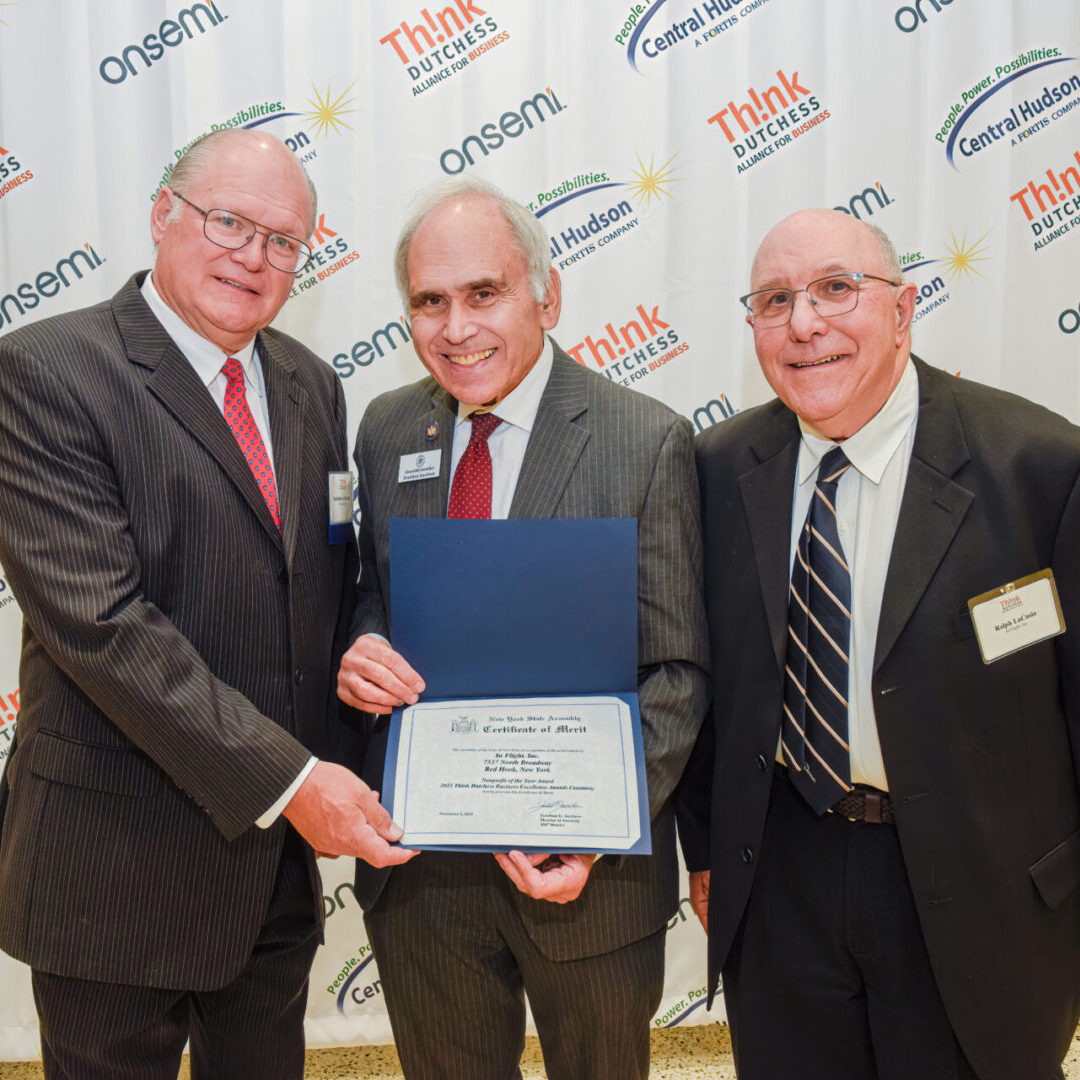 Nonprofit of the Year Award: Matthew G. Bateman, alongside the Honorable Jonathan G. Jacobson, and In Flight Board President Ralph LaCasio.